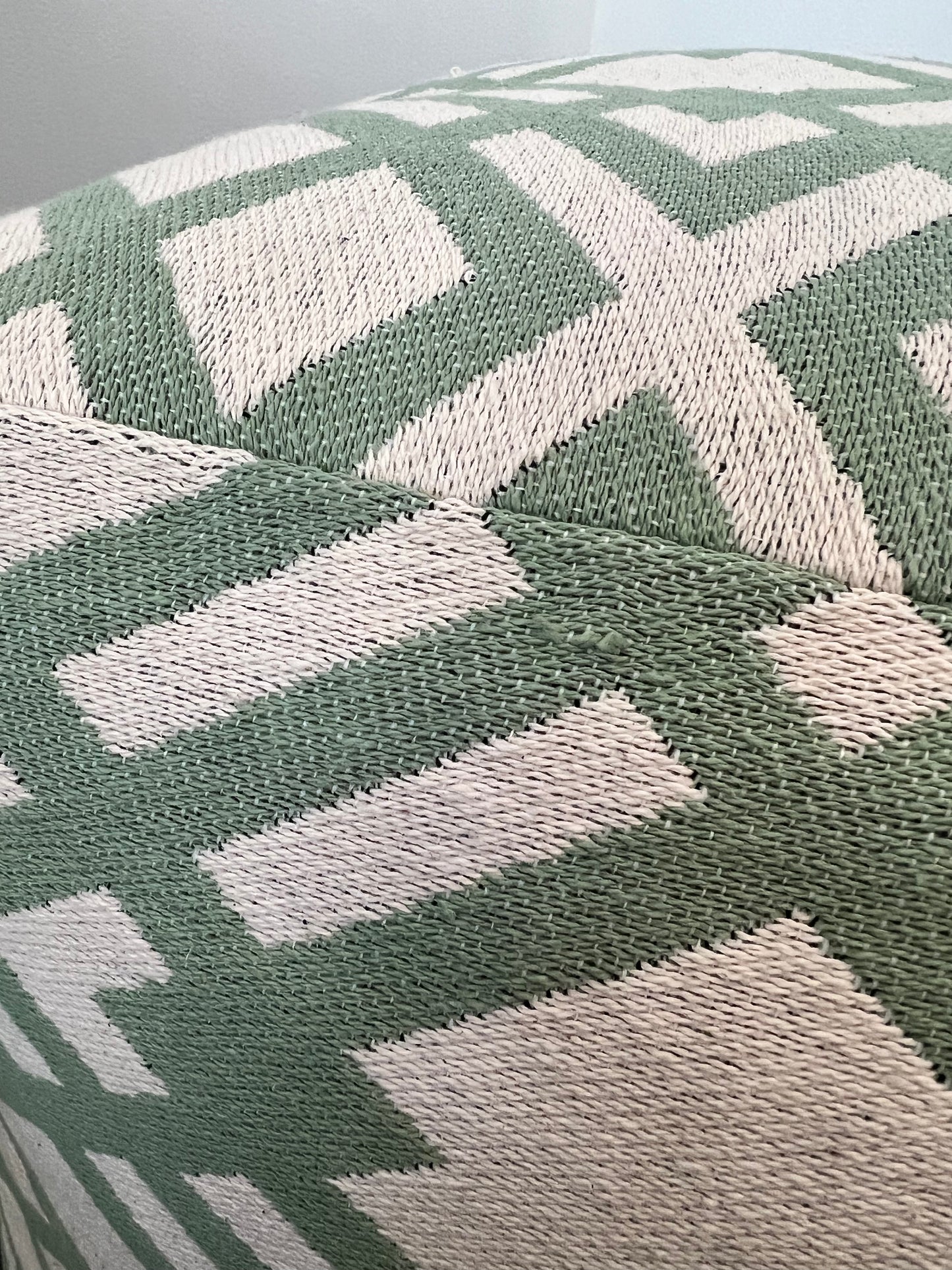 Green and white poof