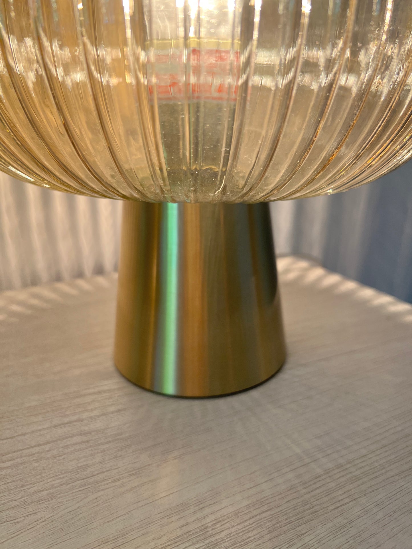 Brass base globe table lamp