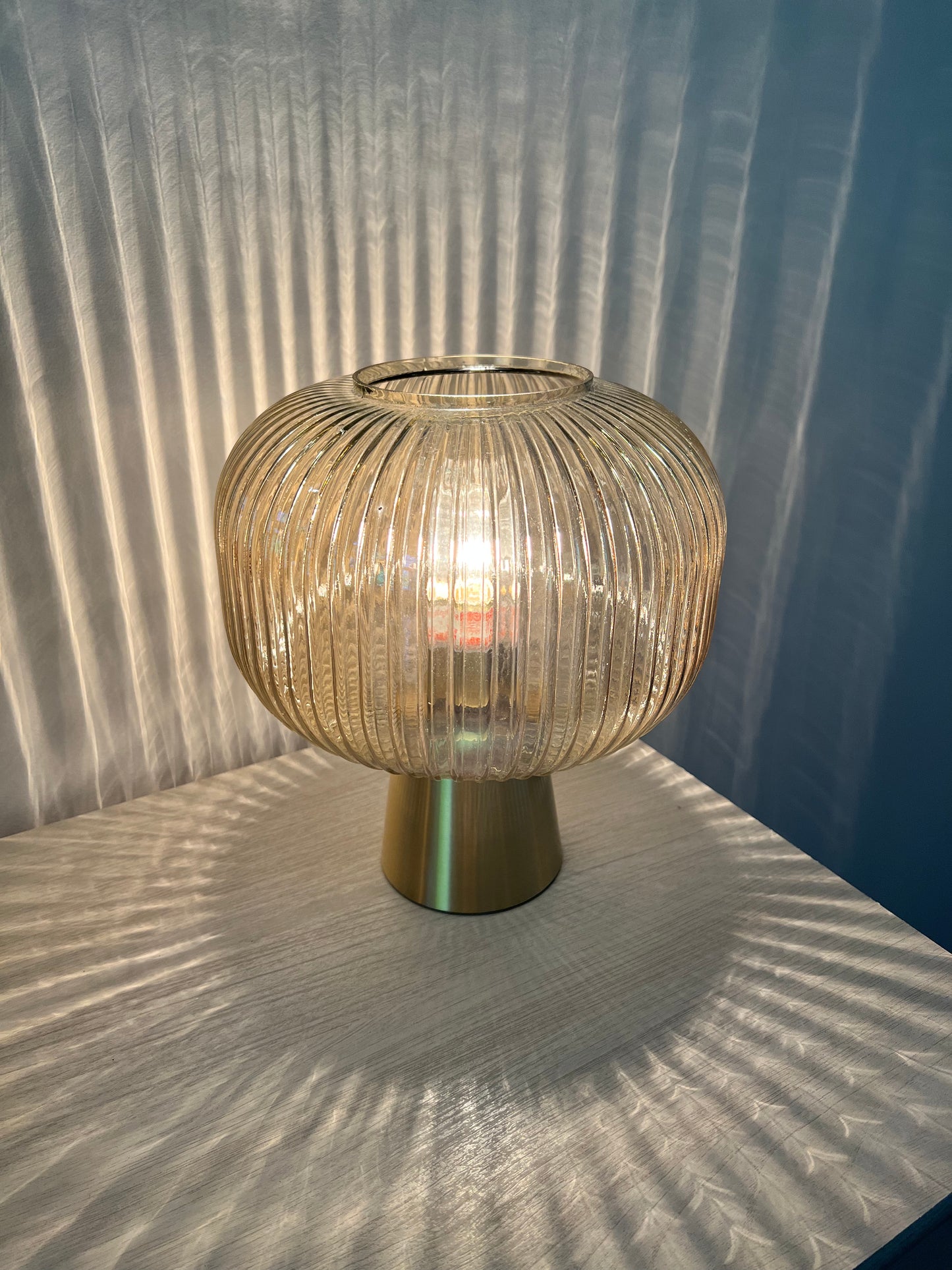 Brass base globe table lamp